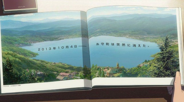 A photo album showing a town with a large lake in the middle of it. It's dated October 4, 2013